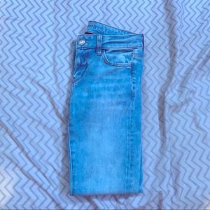 Light wash speckled skinny jeans